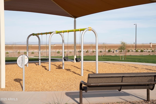 community play area featuring a mountain view