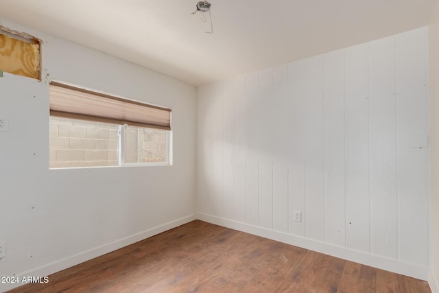 empty room featuring hardwood / wood-style floors