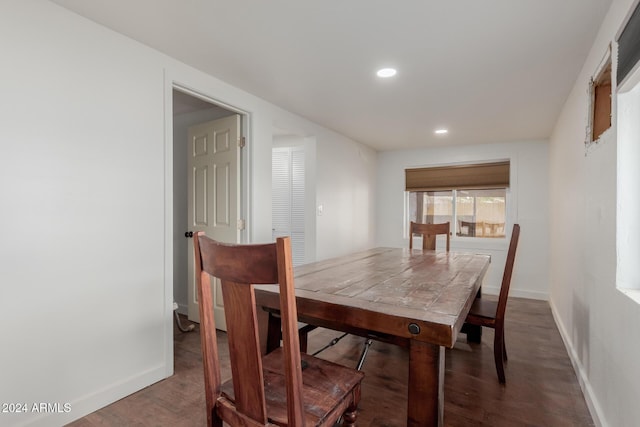 dining room featuring dark hardwood / wood-style flooring