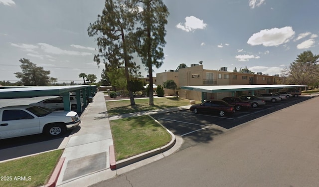view of partially covered parking lot