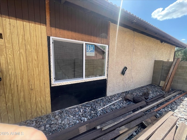 view of property exterior with stucco siding