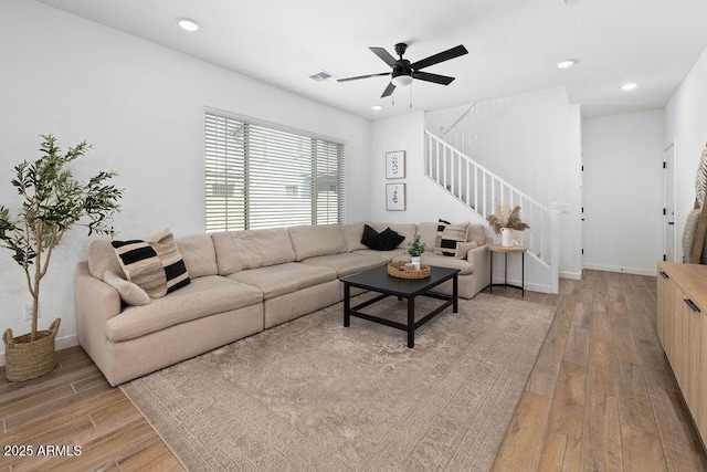 9230 E Scott Ave, Mesa, AZ 85212 - living room with light wood-style floors, stairway, ceiling fan, recessed lighting, and baseboards