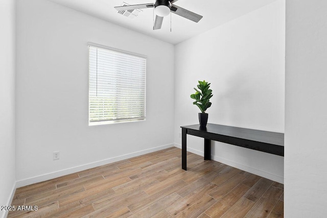 9230 E Scott Ave, Mesa, AZ 85212 - unfurnished office with wood finished floors, a ceiling fan, and baseboards