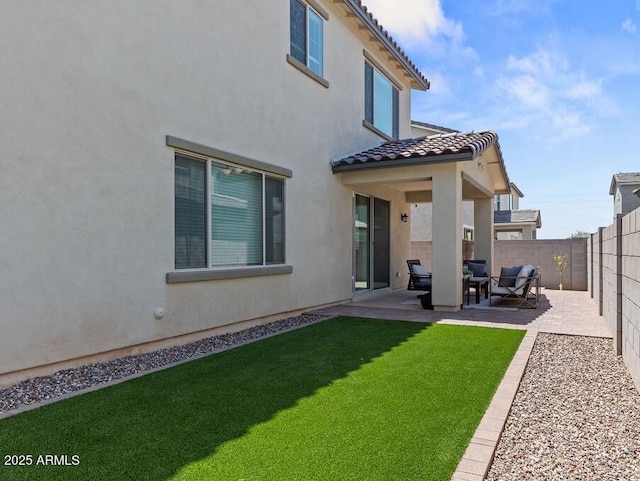 9230 E Scott Ave, Mesa, AZ 85212 - back of property with a patio area, stucco siding, a tiled roof, and an outdoor hangout area