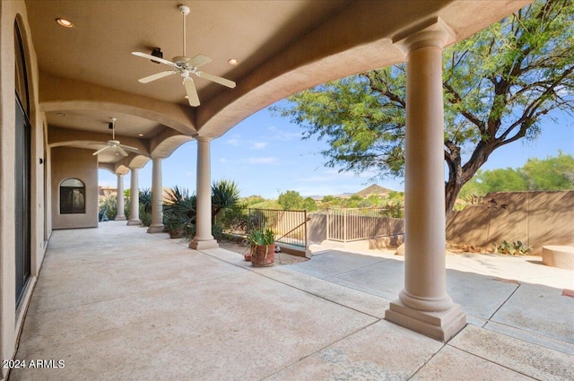 view of patio featuring ceiling fan