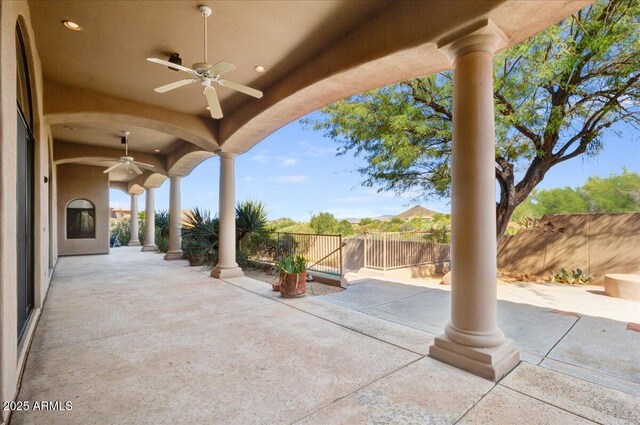 view of patio with ceiling fan