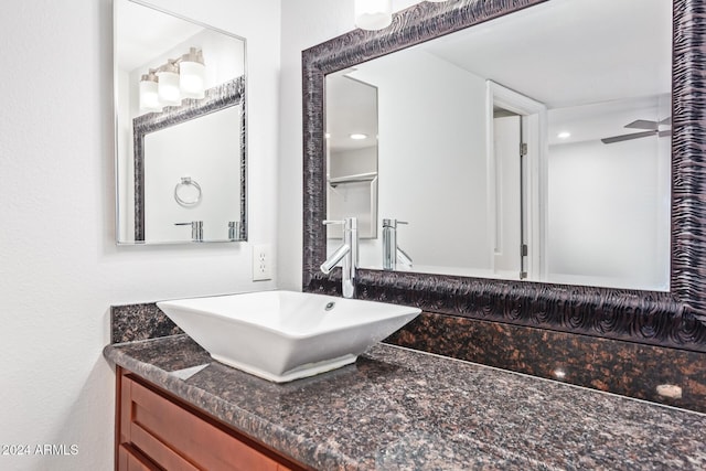 bathroom with vanity and ceiling fan