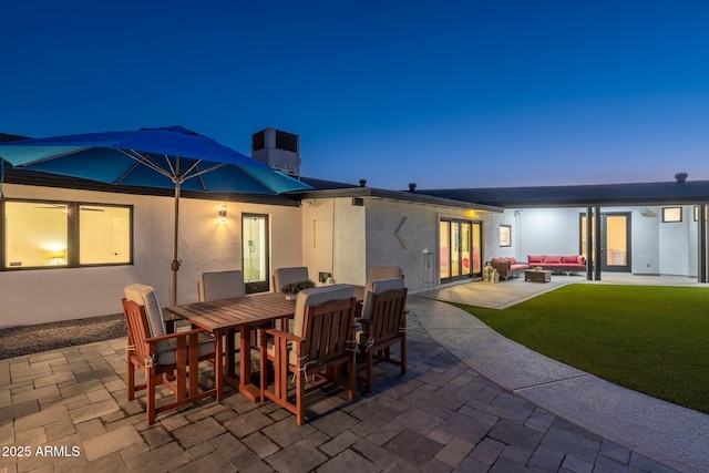 view of patio featuring outdoor dining area and an outdoor hangout area