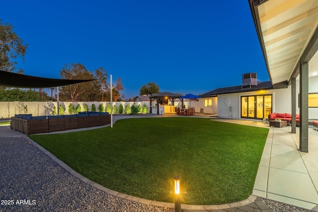 view of yard featuring an outdoor hangout area, fence, a patio, and cooling unit