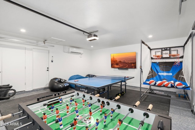 game room featuring a garage, recessed lighting, and a wall mounted AC