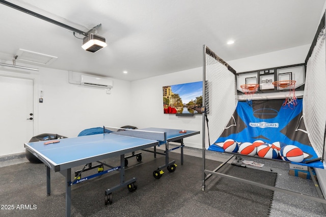 game room with recessed lighting, baseboards, and a wall unit AC