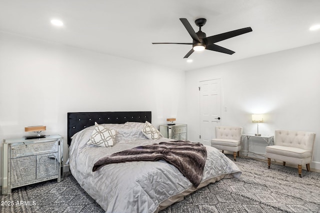 carpeted bedroom with baseboards, a ceiling fan, and recessed lighting