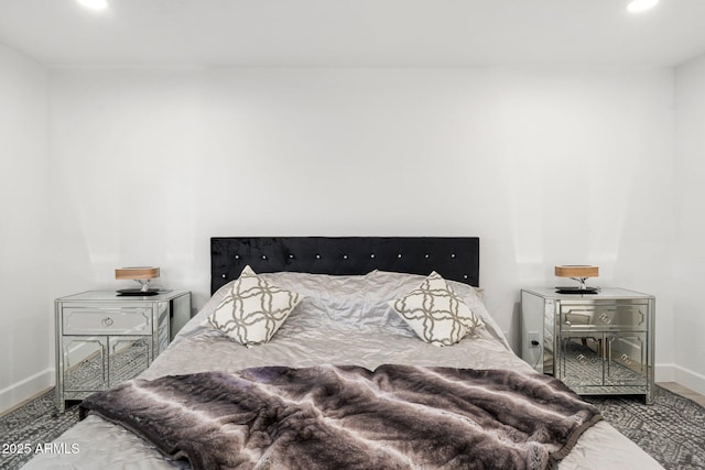 bedroom with baseboards and recessed lighting