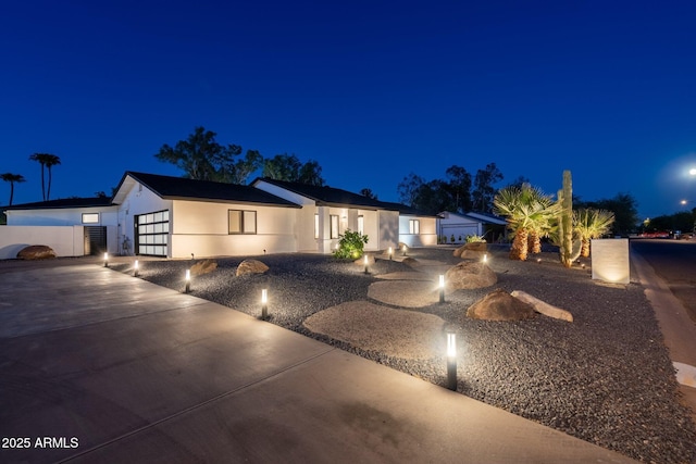 single story home with stucco siding