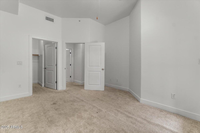 945 E Playa Del Norte Dr Unit 1016, Tempe, AZ 85288 - unfurnished bedroom with carpet, a spacious closet, and a closet