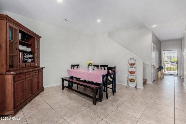 dining space with light tile patterned floors, recessed lighting, visible vents, and baseboards