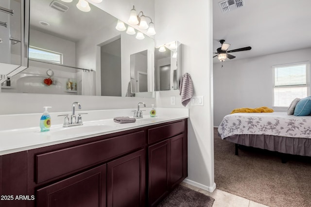 ensuite bathroom with visible vents, a healthy amount of sunlight, and ensuite bathroom