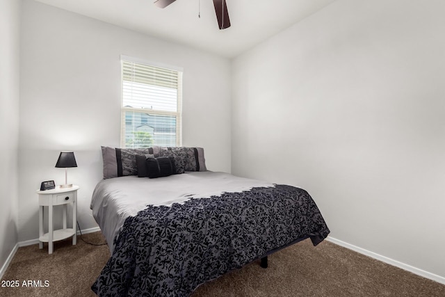 bedroom featuring baseboards, carpet, and ceiling fan