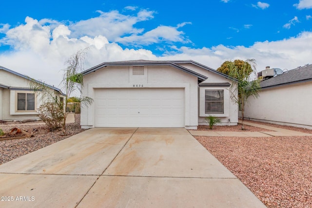 ranch-style home with a garage