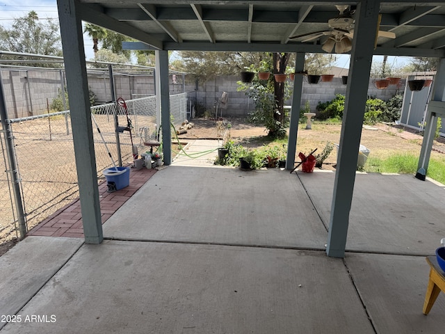 11221 N 91st Dr, Peoria, AZ 85345 - fenced backyard with a patio and ceiling fan