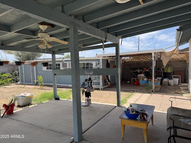 11221 N 91st Dr, Peoria, AZ 85345 - fenced backyard with a patio and a ceiling fan