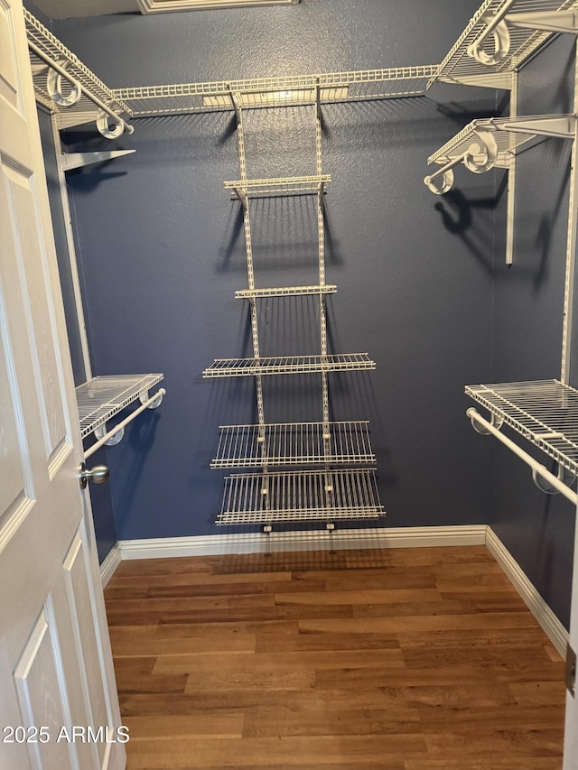 11221 N 91st Dr, Peoria, AZ 85345 - spacious closet with wood finished floors
