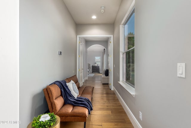 hallway with light wood-type flooring