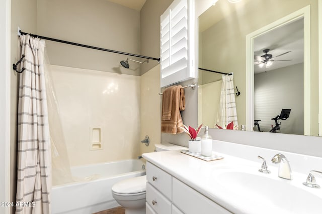 full bathroom featuring ceiling fan, vanity, shower / tub combo, and toilet