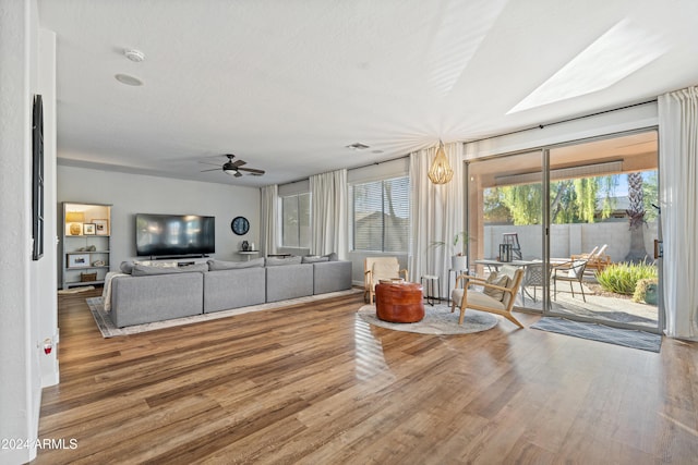 2811 E Riviera Pl, Chandler, AZ 85249 - living room featuring wood finished floors and a ceiling fan