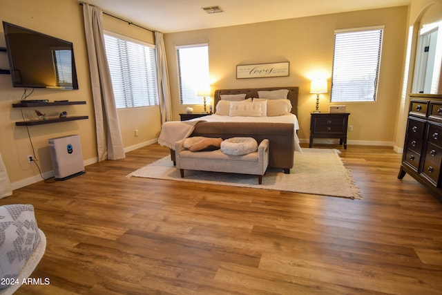 bedroom featuring hardwood / wood-style floors