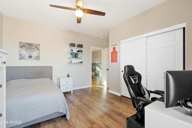 2811 E Riviera Pl, Chandler, AZ 85249 - bedroom with wood finished floors, an office area, a closet, and ceiling fan