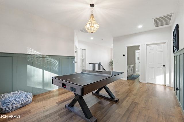 2811 E Riviera Pl, Chandler, AZ 85249 - game room with a chandelier, wood finished floors, and recessed lighting