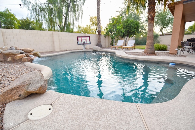 view of pool featuring a patio area and pool water feature