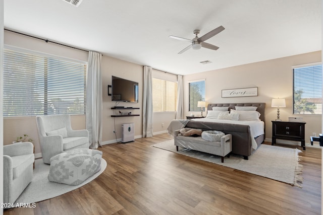 2811 E Riviera Pl, Chandler, AZ 85249 - bedroom featuring wood finished floors, baseboards, and a ceiling fan