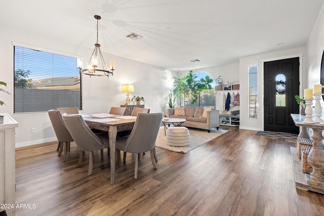 2811 E Riviera Pl, Chandler, AZ 85249 - dining area with a chandelier, wood finished floors, and plenty of natural light