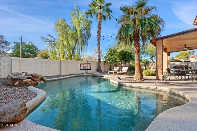2811 E Riviera Pl, Chandler, AZ 85249 - view of swimming pool with a fenced backyard, a patio area, ceiling fan, and outdoor dining space