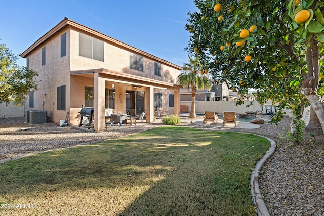 2811 E Riviera Pl, Chandler, AZ 85249 - back of house with a patio, a ceiling fan, stucco siding, and central air condition unit