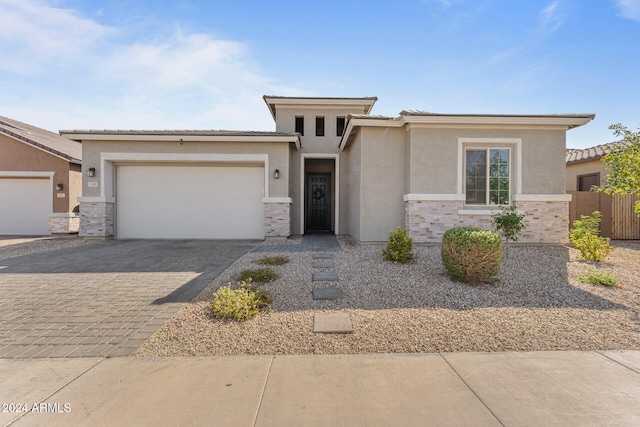 prairie-style home with a garage