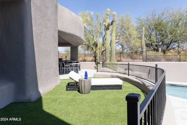 view of yard featuring fence and a patio