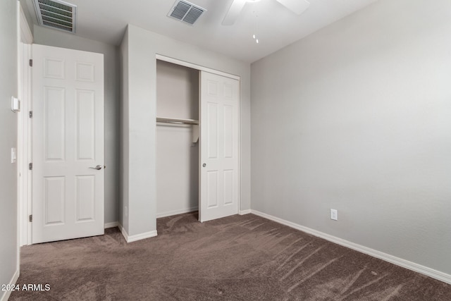 unfurnished bedroom featuring ceiling fan, carpet floors, and a closet