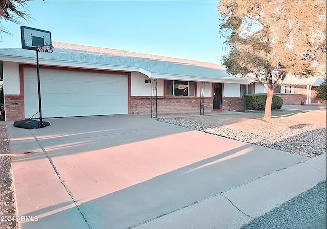 single story home with a garage