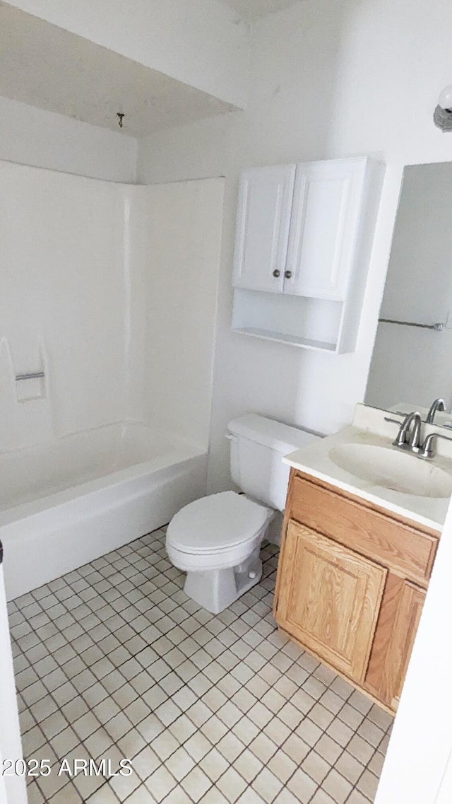 full bathroom featuring vanity, tile patterned flooring, tub / shower combination, and toilet