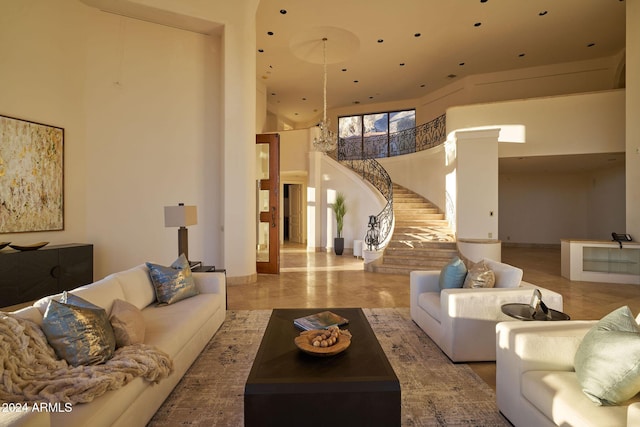 living room featuring a high ceiling