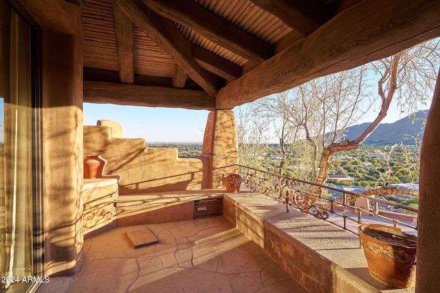 balcony featuring a mountain view