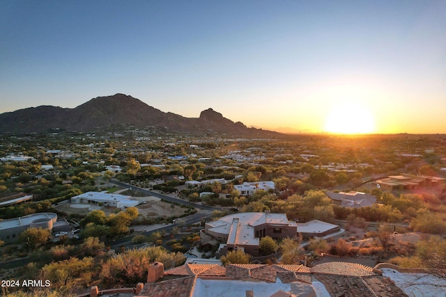 aerial view at dusk with a mountain view