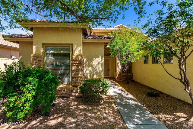 12726 W Charter Oak Rd, El Mirage, AZ 85335 - exterior space featuring a tile roof and stucco siding