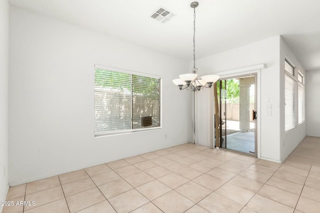 12726 W Charter Oak Rd, El Mirage, AZ 85335 - spare room with visible vents, a notable chandelier, and light tile patterned floors
