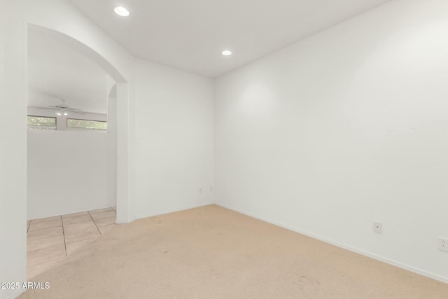 12726 W Charter Oak Rd, El Mirage, AZ 85335 - empty room featuring light carpet, arched walkways, recessed lighting, and ceiling fan