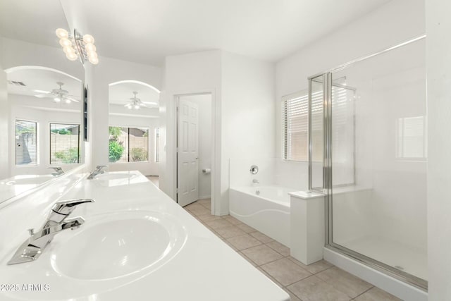 12726 W Charter Oak Rd, El Mirage, AZ 85335 - full bathroom with a shower stall, a garden tub, ceiling fan, and a sink