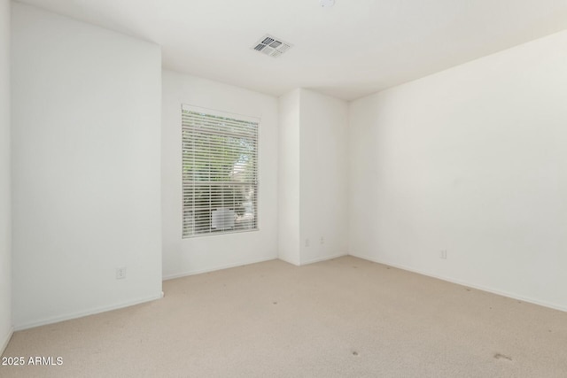 12726 W Charter Oak Rd, El Mirage, AZ 85335 - carpeted empty room with baseboards and visible vents